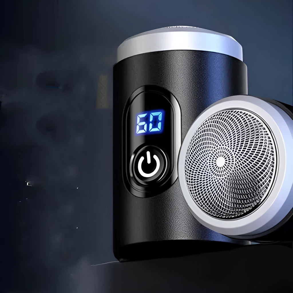 Black mini portable rechargeable shaver with USB cable and cleaning brush on a white background.