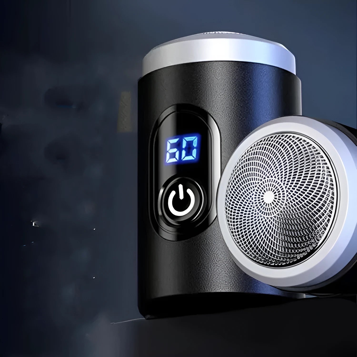 Black mini portable rechargeable shaver with USB cable and cleaning brush on a white background.