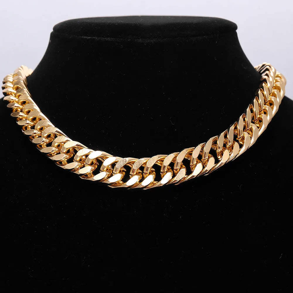 Women's gold electroplated thick chain necklace showing 32cm length and alloy construction