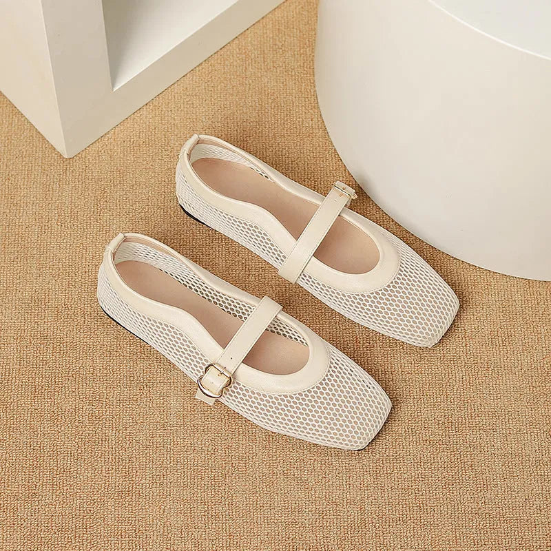 Women's beige mesh summer pump with square toe and buckle closure on a low flat heel.
