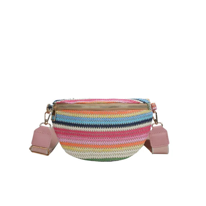Women's woven straw beach bag with single shoulder strap in blue or pink