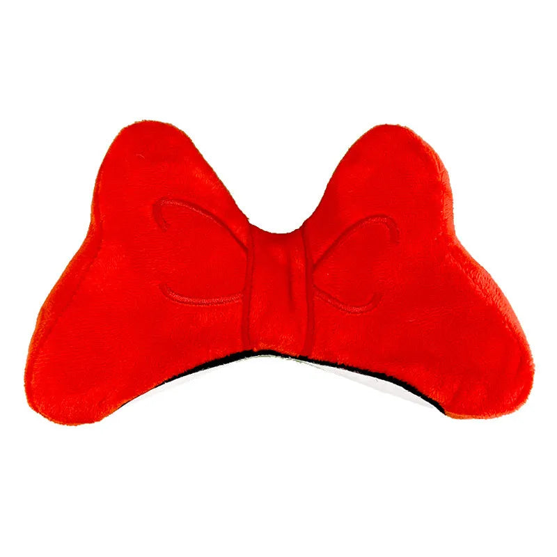Soft plush bow tie helmet decoration for electric motorcycle and ski helmets in red, peach pink, and rose pink.