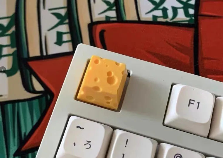 Yellow resin cheese character keycap for mechanical keyboards with Cherry MX compatibility