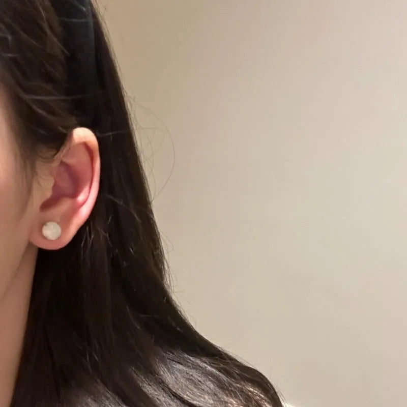 Chinese retro style chalcedony stud earrings with geometric round egg surface and four-claw stone setting