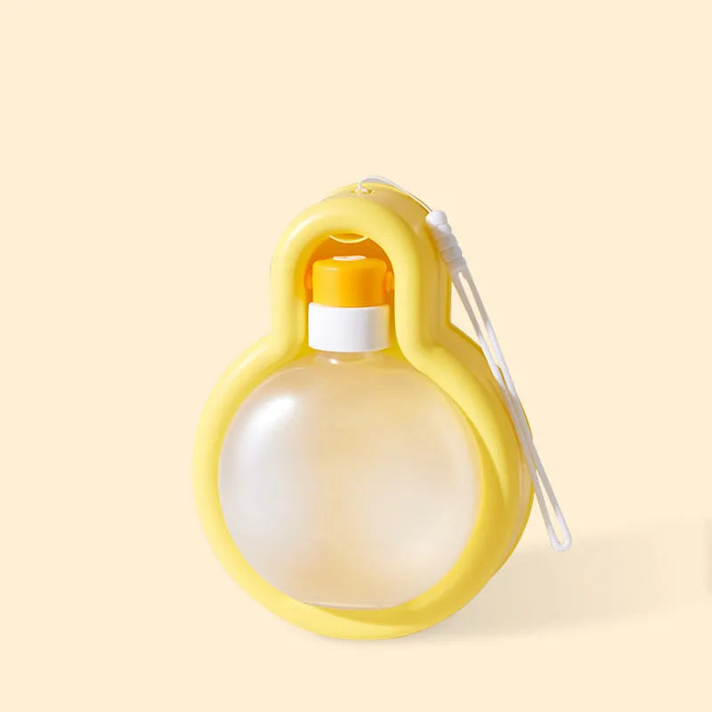 Green portable dog travel water bottle with pull-out drinking bowl, shown with size dimensions.