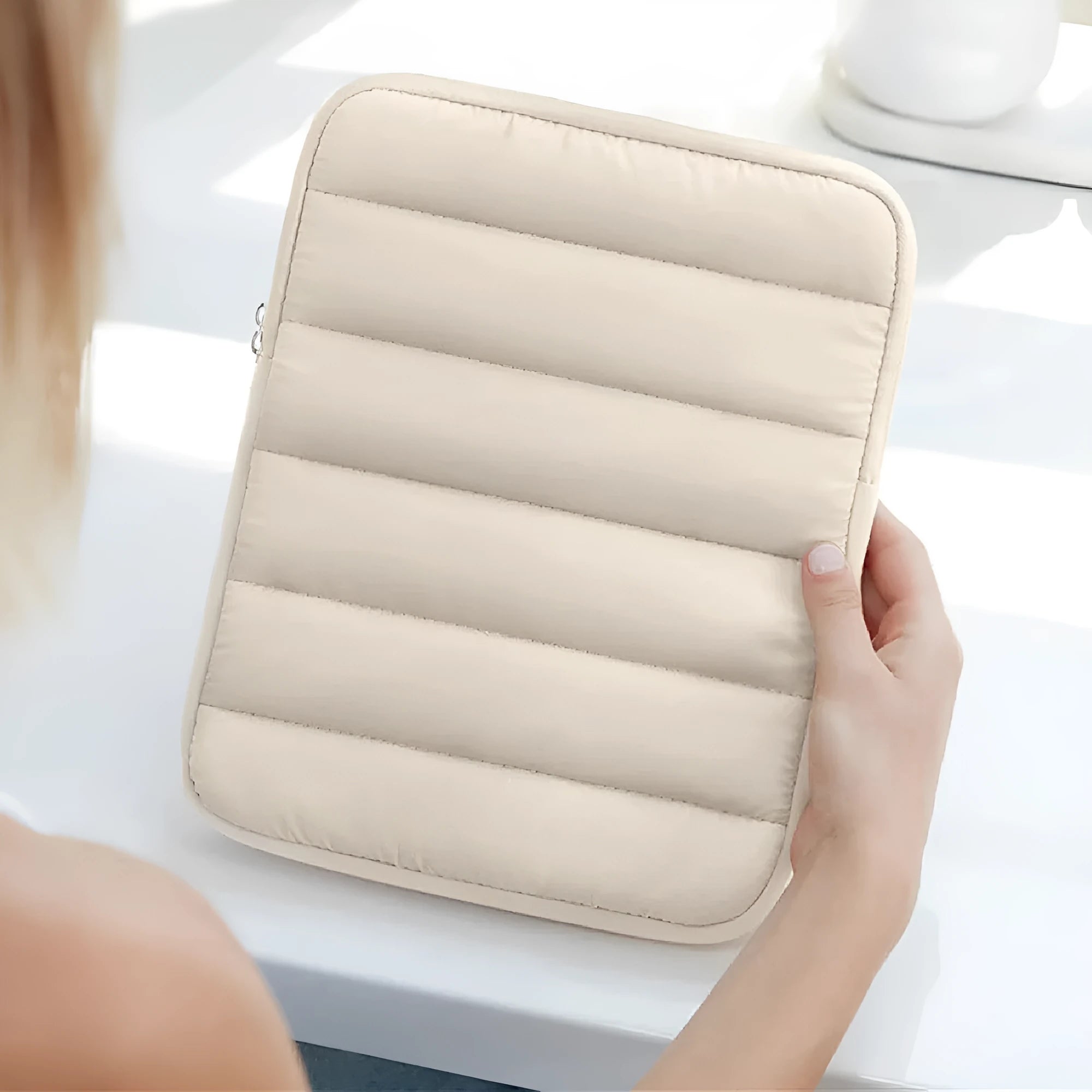 Puff Bag fluffy laptop sleeve for 9.7-11 inch devices in black, khaki, or silver.