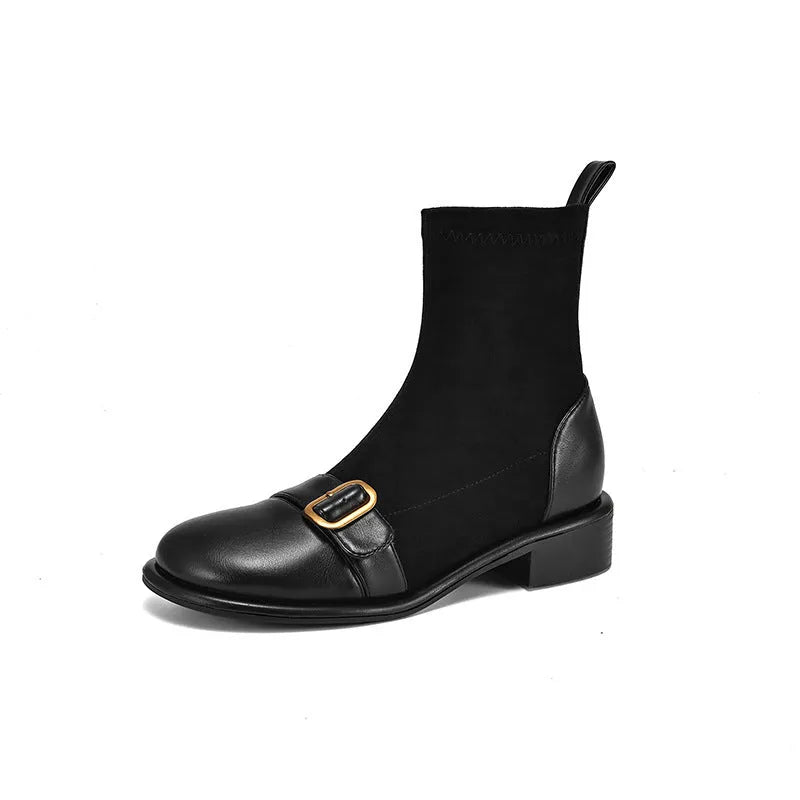 Black women's low heel Martin ankle boots with front lace-up and metal buckle detail on a white background.