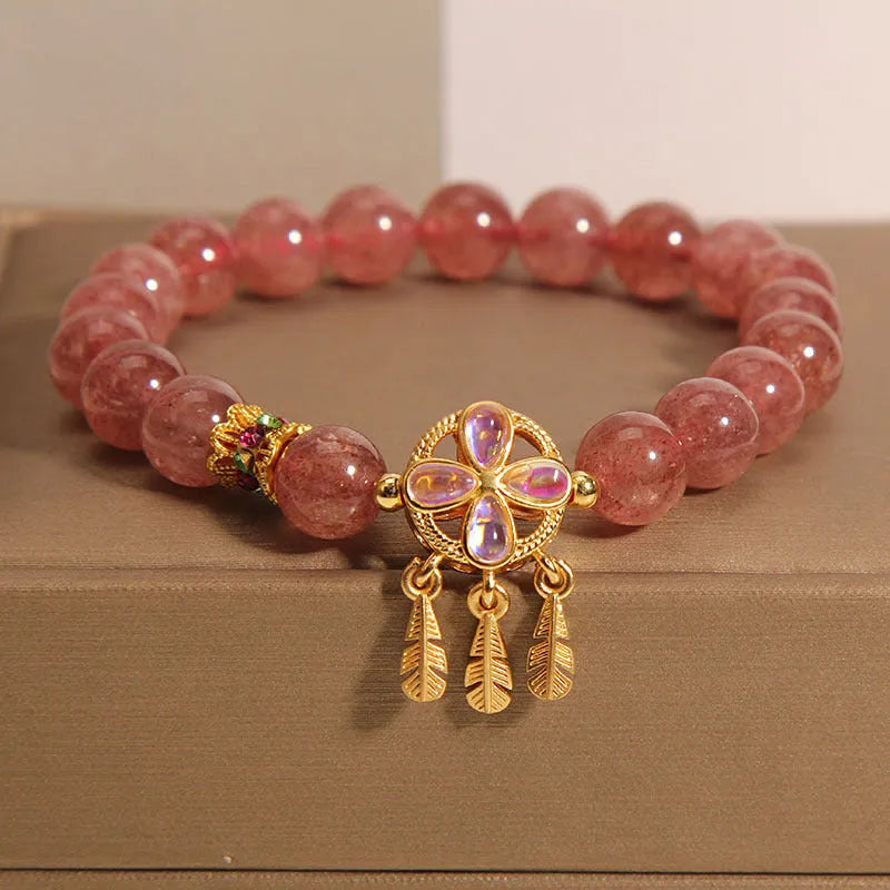 Women's strawberry quartz crystal bracelet with four-leaf clover dream catcher pendant