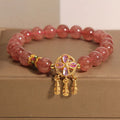 Women's strawberry quartz crystal bracelet with four-leaf clover dream catcher pendant