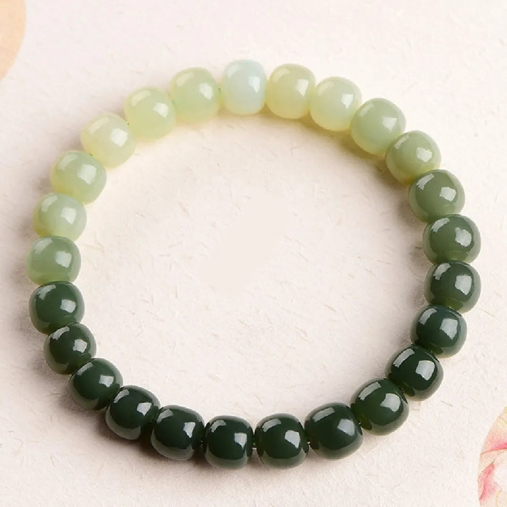 Natural Hetian jade bracelet with water gradient colours in polished beads