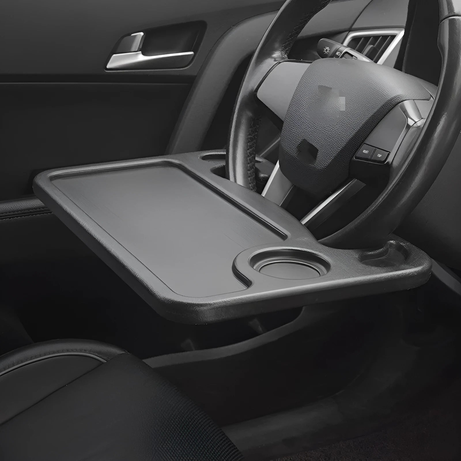 Black plastic car desk and storage stand with food tray, dimensions 42cm by 28cm.