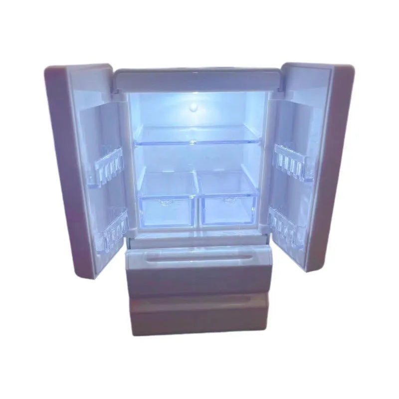 White plastic miniature candy toy model with lighting feature showing detailed candy design