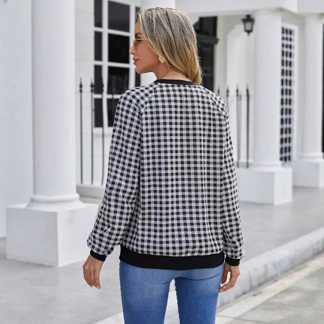 Black long sleeve pullover sweater with a Japanese sweet plaid striped pattern.