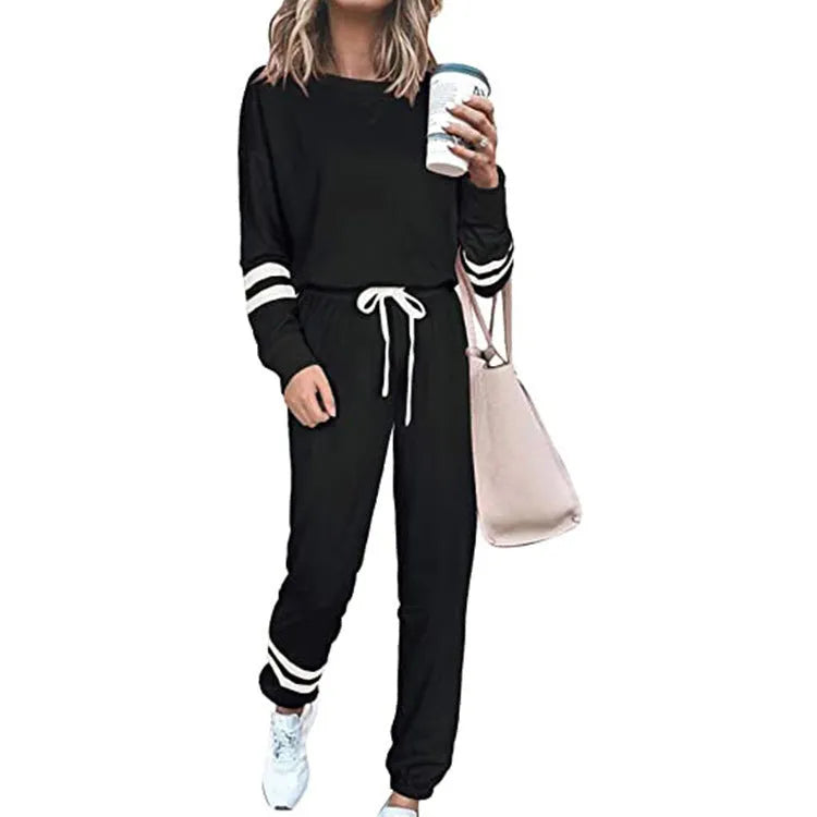Women's plus size loose-fitting casual suit co-ord in solid colour with half sleeve top and pants