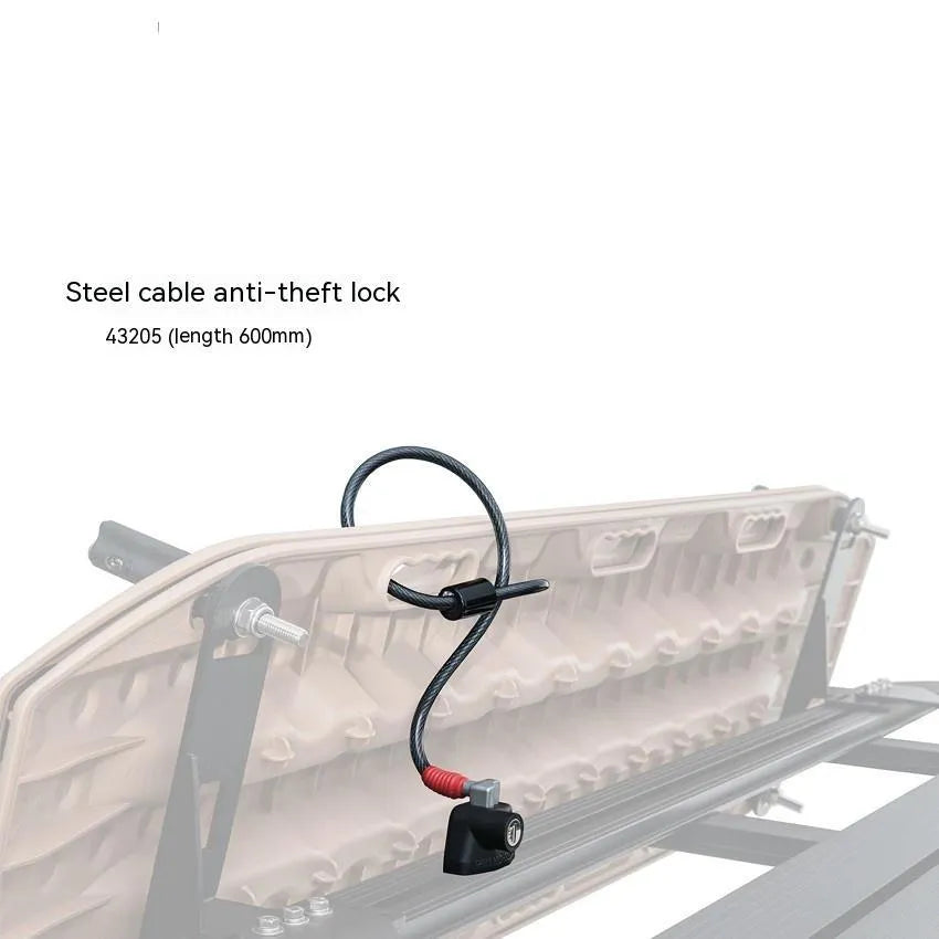 Roof platform steel cable lock with plastic sheath securing a kayak to roof bars.