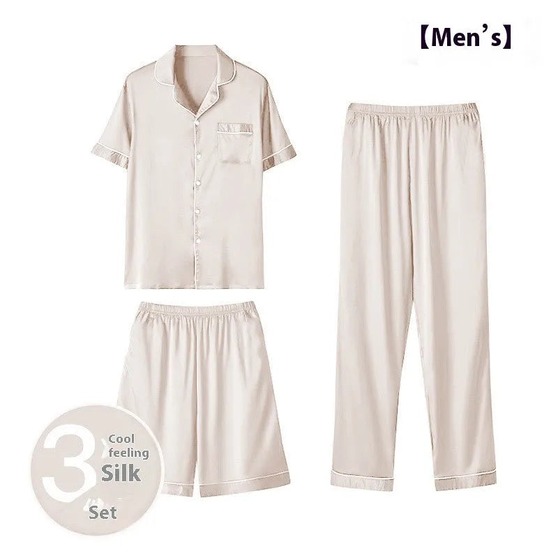 Men's black ice silk three-piece home wear suit featuring a sleeveless top, shorts, and trousers laid flat