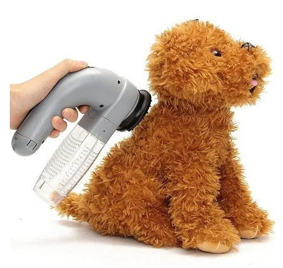 Grey portable electric pet hair vacuum cleaner with soft rubber head for grooming dogs and cats