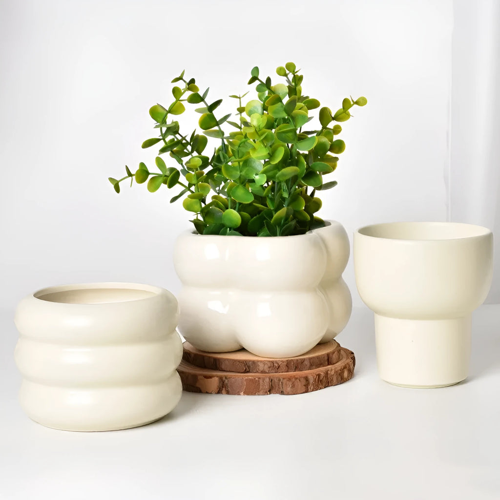 Matte yellow ceramic flower pot with Roman column colour finish for home plant decoration.