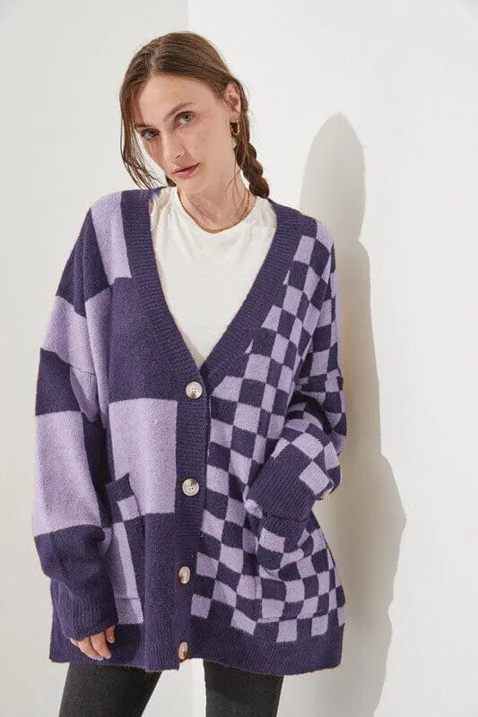Grey printed checks knitwear cardigan on a model, showing loose slim fit and regular sleeves.
