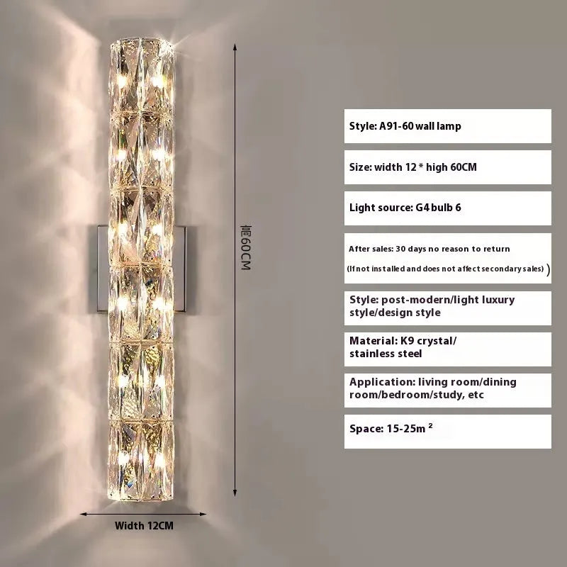 Slim crystal and stainless steel wall lamp with LED light on a wall.