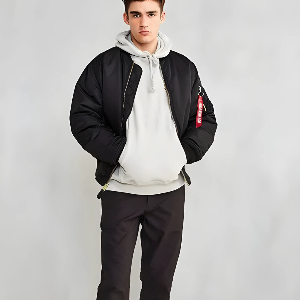 Men's army green loose fit cotton-padded bomber jacket with front zip and ribbed cuffs.