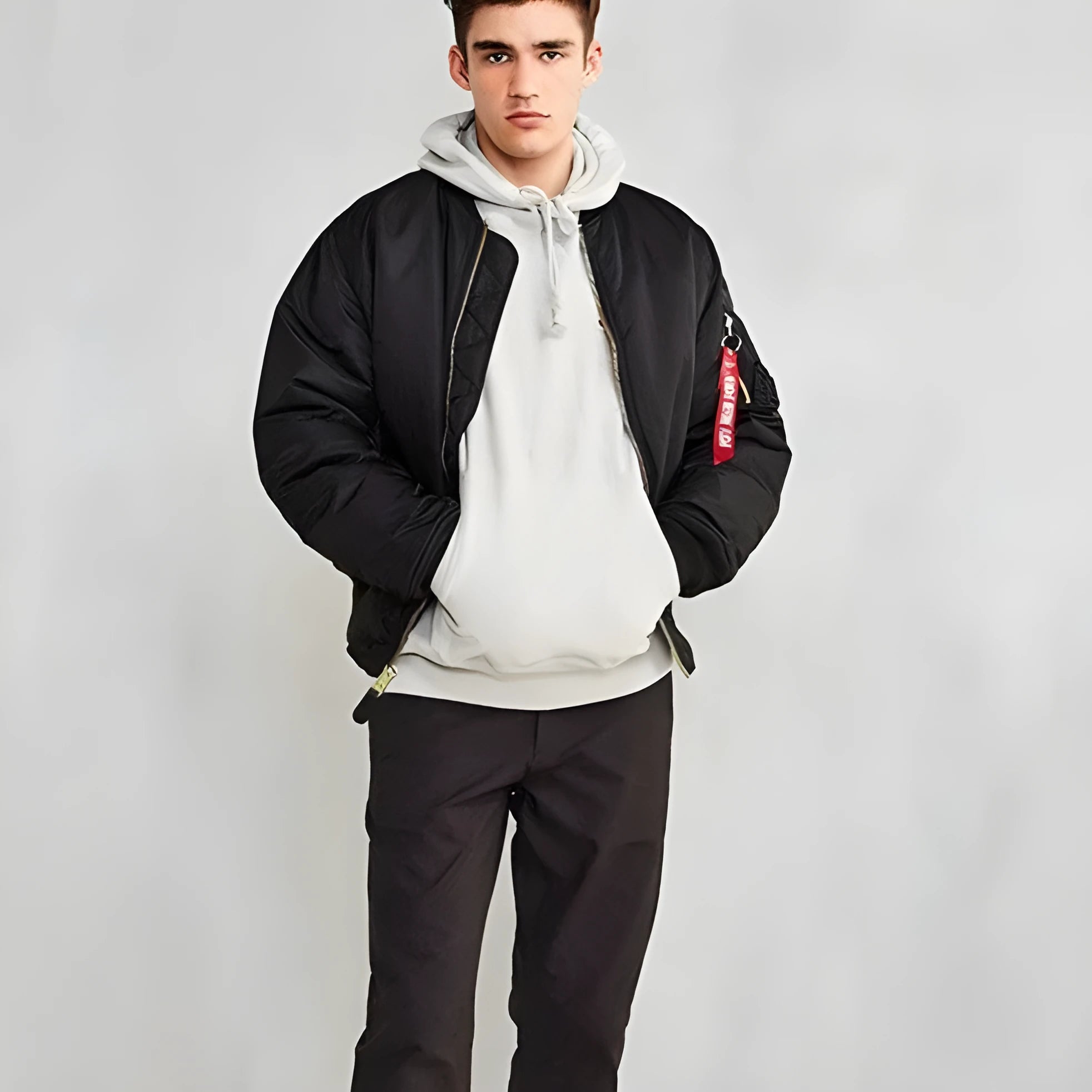 Men's army green loose fit cotton-padded bomber jacket with front zip and ribbed cuffs.