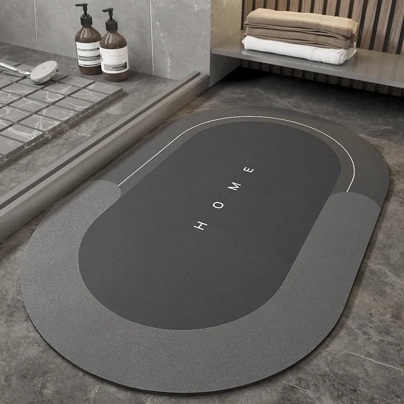Blended fabric floor mat in an oval shape on a bathroom floor, available in multiple colours and sizes.