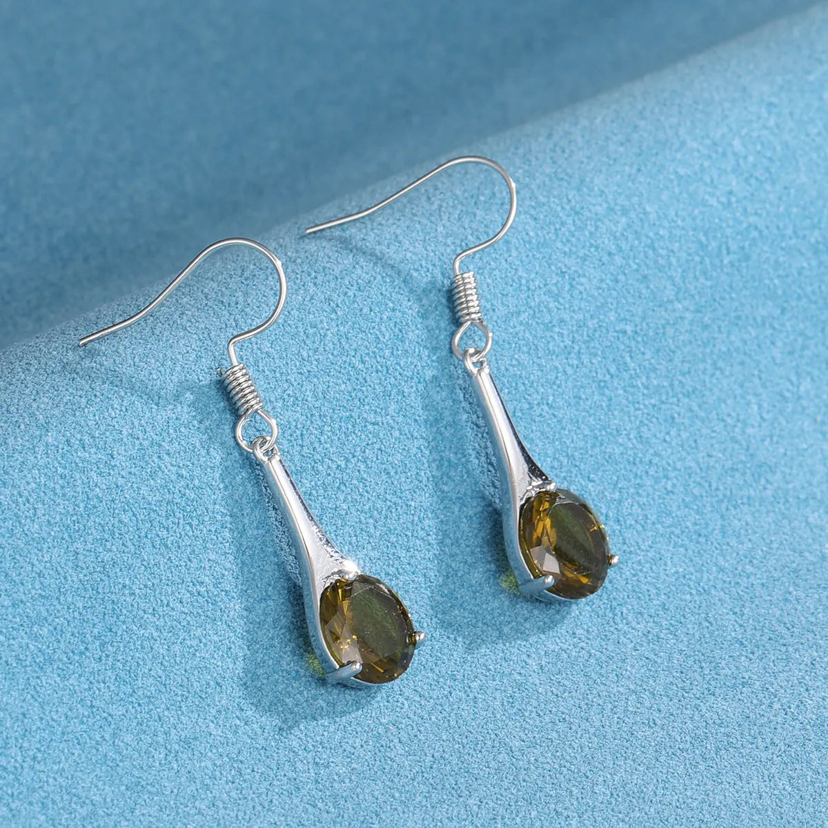Olive green topaz colour water drop shaped earrings with retro minimalist design