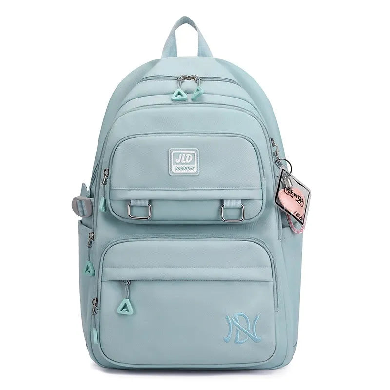 Girls large capacity nylon school backpack in purple with waterproof anti-theft features and breathable back panel