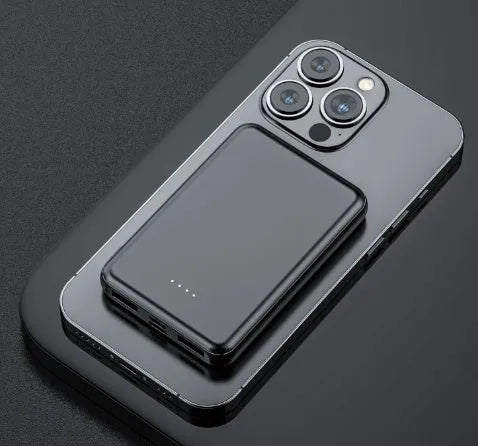 Black universal USB power bank for electric heating vests showing compact size.
