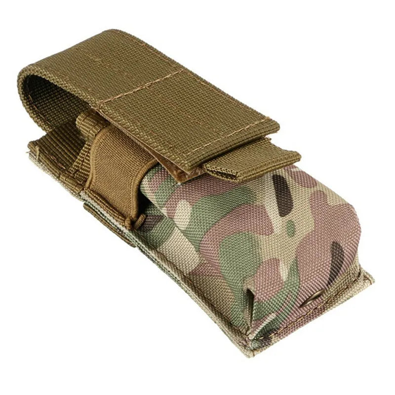 Black tactical MOLLE pistol magazine pouch with elastic cord closure, shown on a vest.
