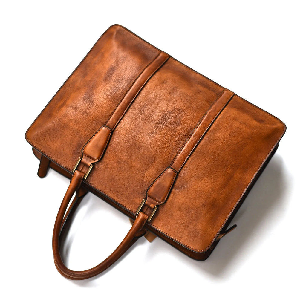 Men's 14 inch horizontal leather handbag in vegetable tanned cowhide with zipper closure