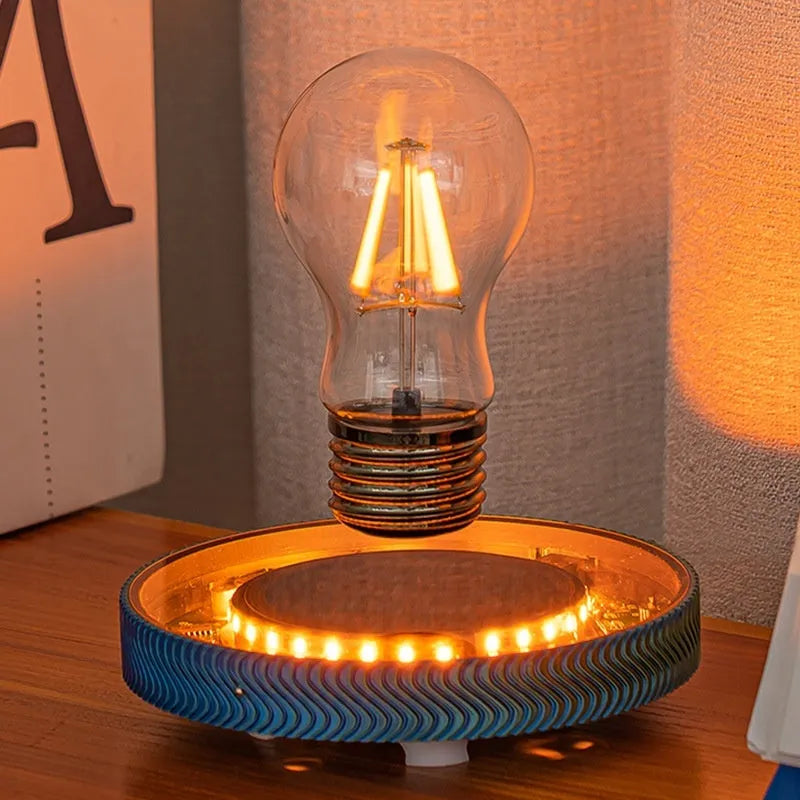 Small magnetic suspension night lamp with a levitating Moon ornament in modern 3D printed design.