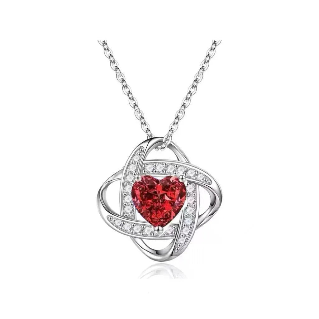 Close-up of a heart-shaped ladies necklace in electroplated copper, showing one of the platinum-toned colour options.