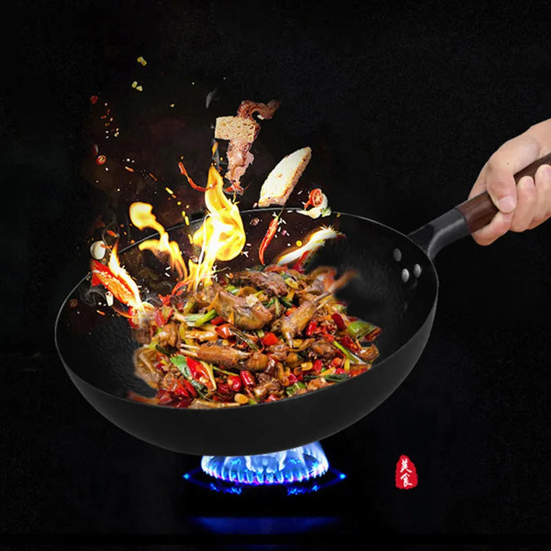 Traditional black iron wok with wooden handle showing 40cm diameter and flat induction base