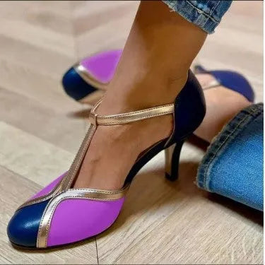 Round toe high heels with button closure in artificial PU and rubber, available in sizes 34-43
