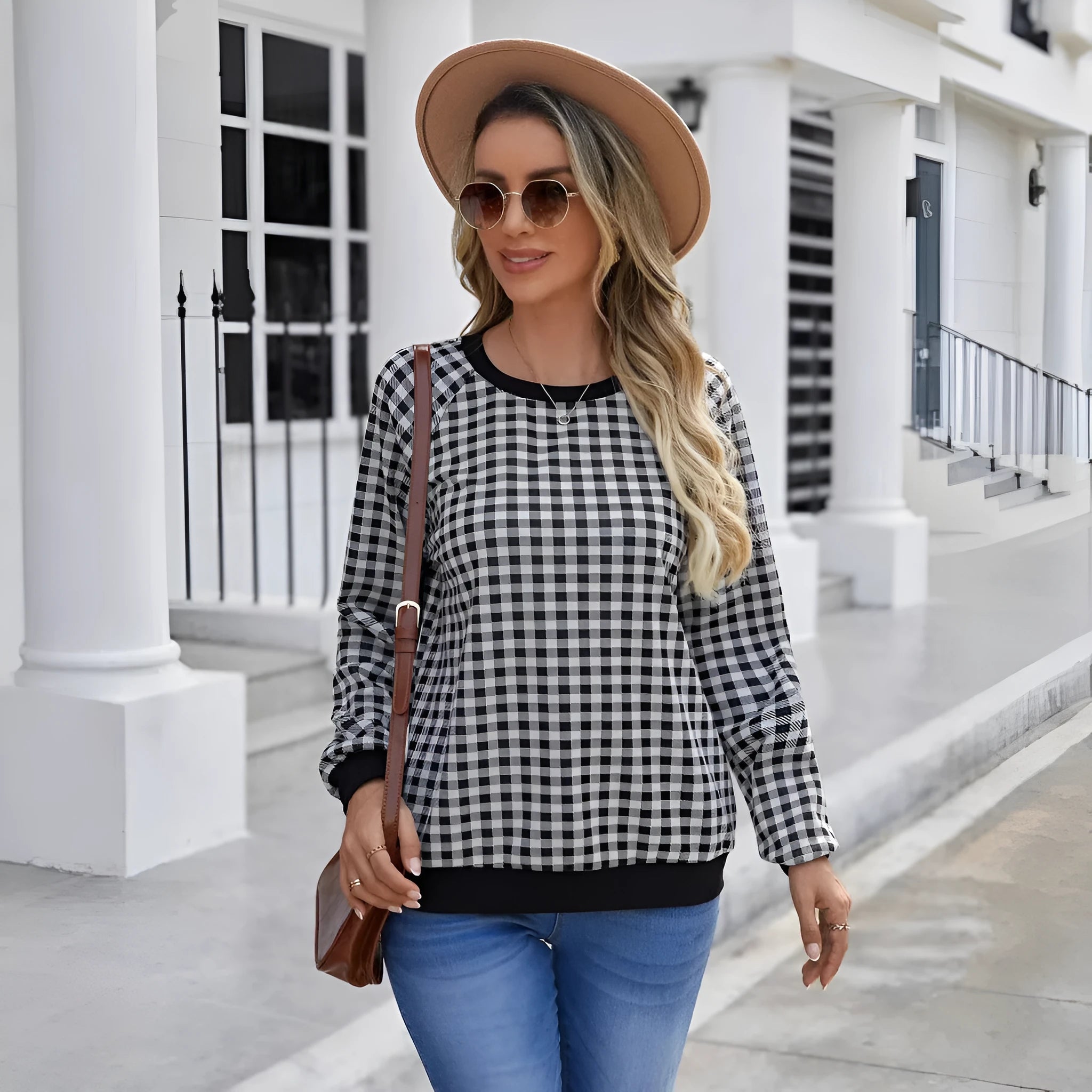 Black long sleeve pullover sweater with a Japanese sweet plaid striped pattern.