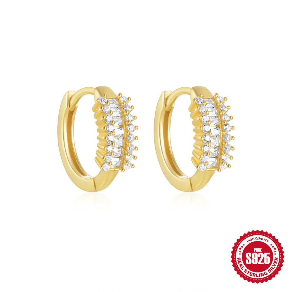Sterling silver geometric stud earrings with small round designs in gold or silver electroplated finishes