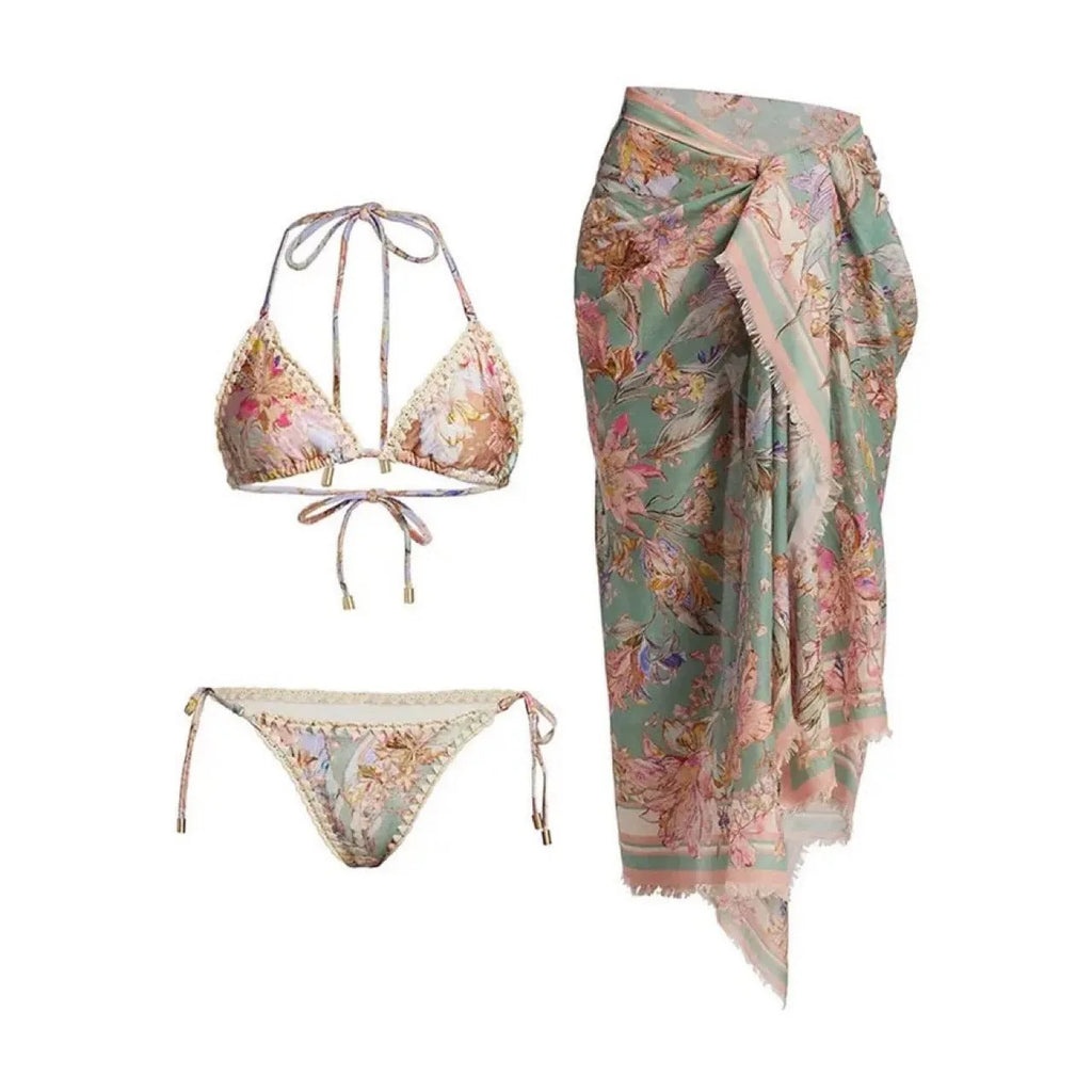 Women's creamy white floral print bikini set with matching skirt for swimming