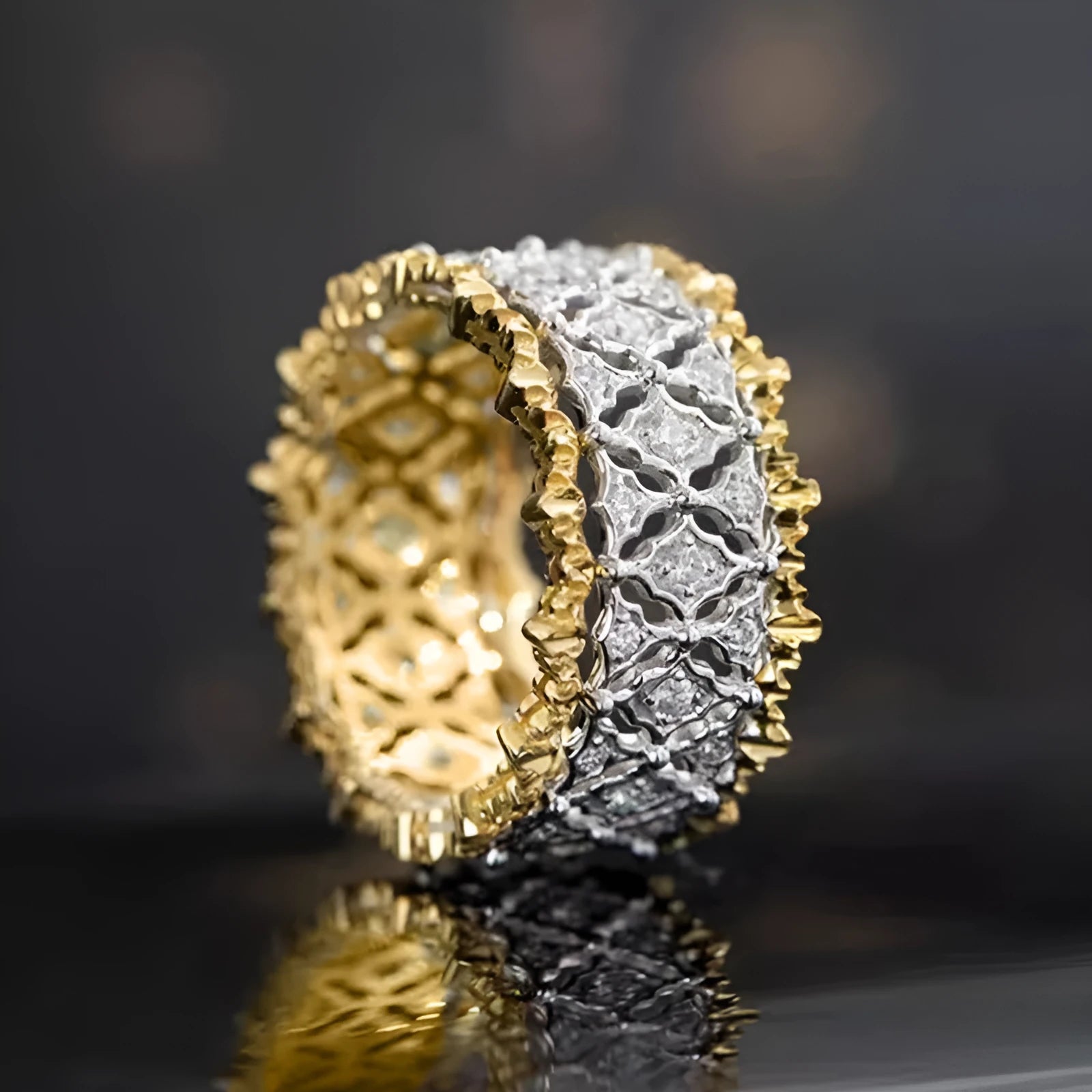 Geometric round two-tone zircon ring in gold colour on a copper base.