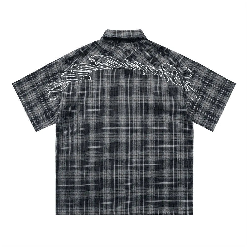 Men's black and brown plaid short sleeve shirt with embroidered letters and lapel collar