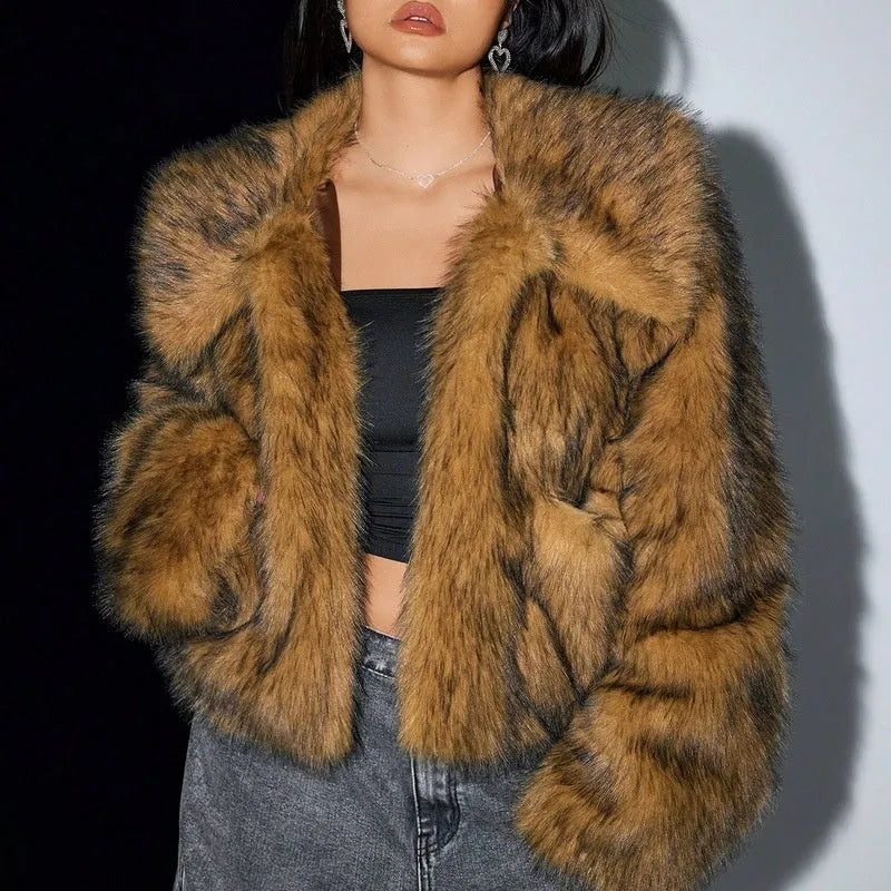 Women's short black artificial fur coat with a full fur collar and long sleeves.