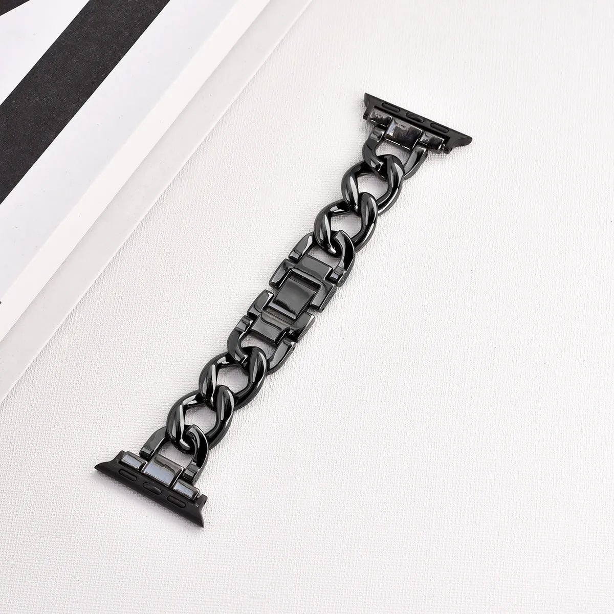 Denim chain link metal Apple Watch replacement strap in silver, black, gold, rose gold, and Starlight colours.