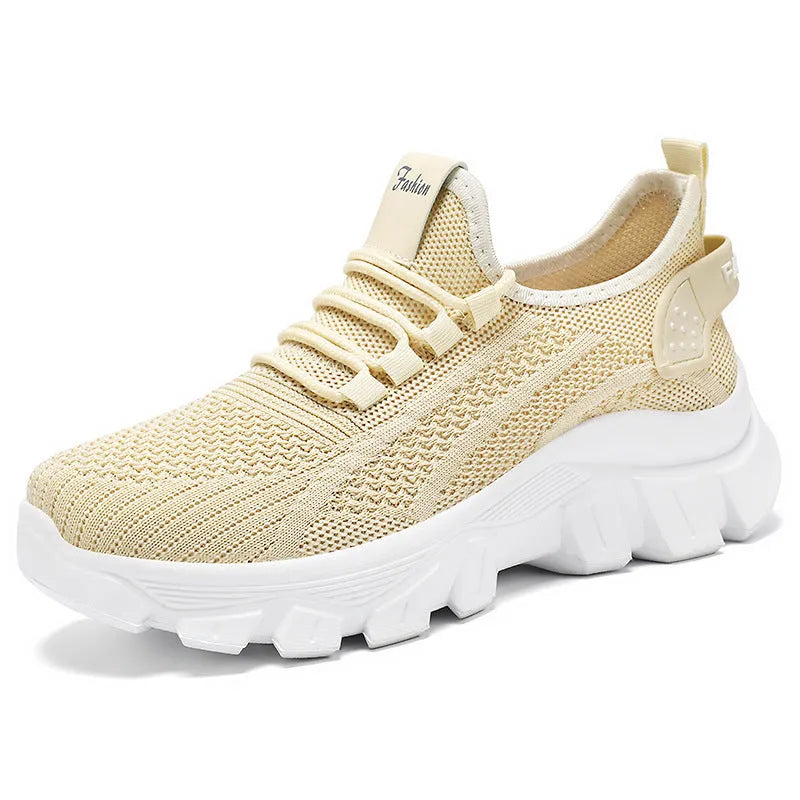 Men's white Flyknit lace-up running sneakers with a thick PVC sole on a plain background.