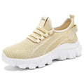 Men's white Flyknit lace-up running sneakers with a thick PVC sole on a plain background.