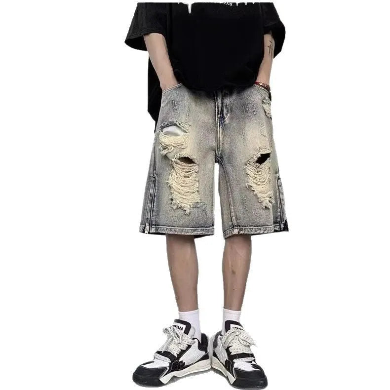 Blue wide-leg retro denim shorts on a neutral background