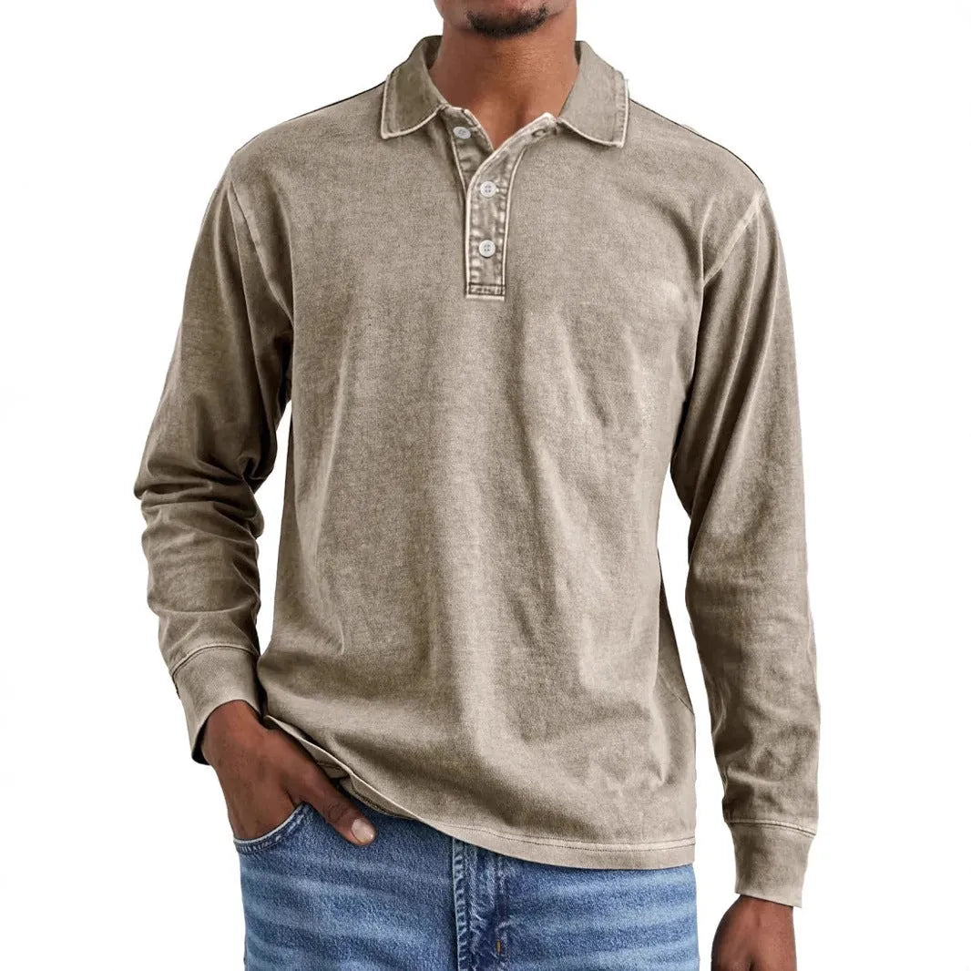 Retro washed pure cotton polo shirt with a distressed lapel and long sleeves on a hanger.