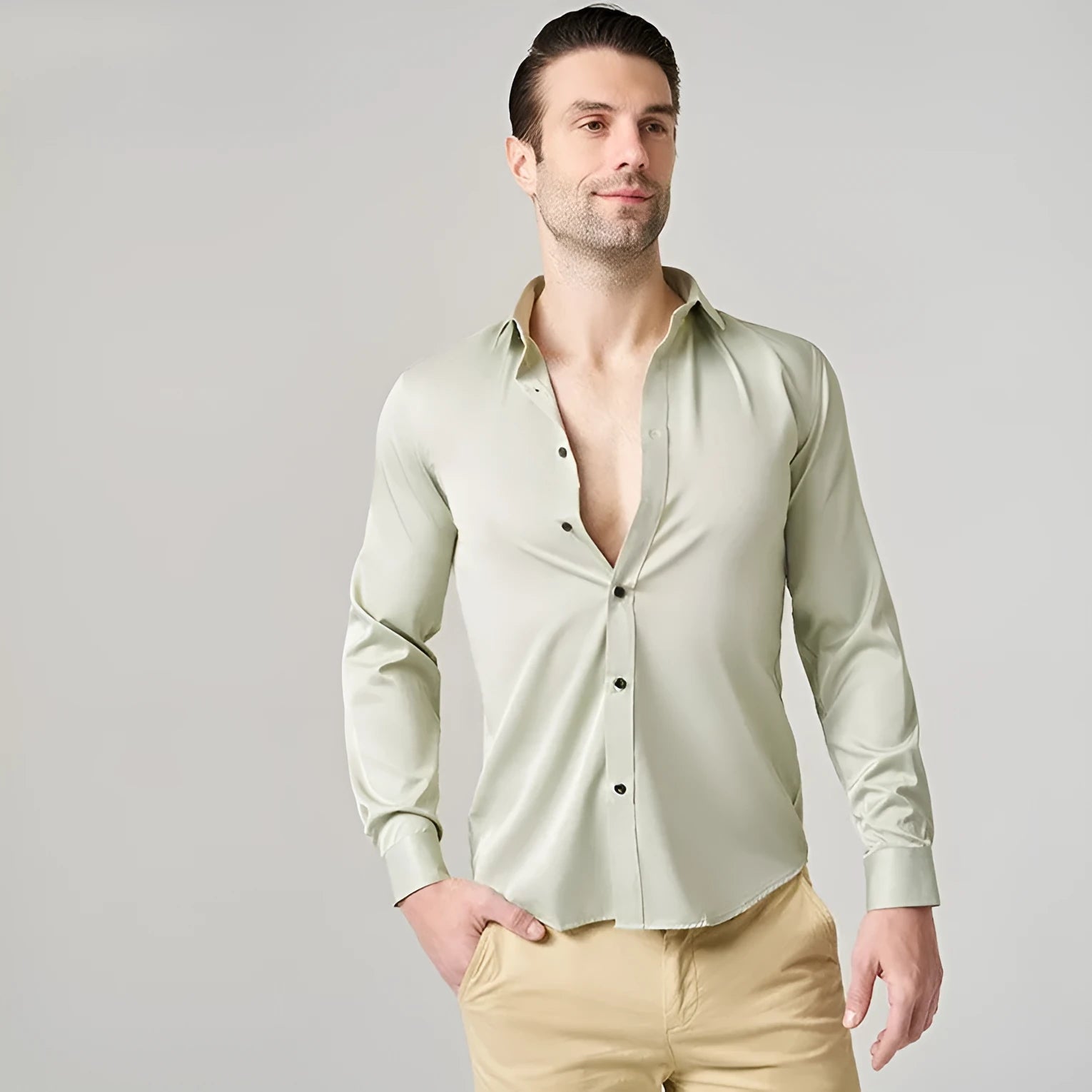 Man wearing a stretch long sleeve polyester work shirt in a neutral colour.