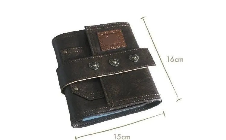 Brown retro notebook with buckle closure showing loose-leaf binding and A7 size