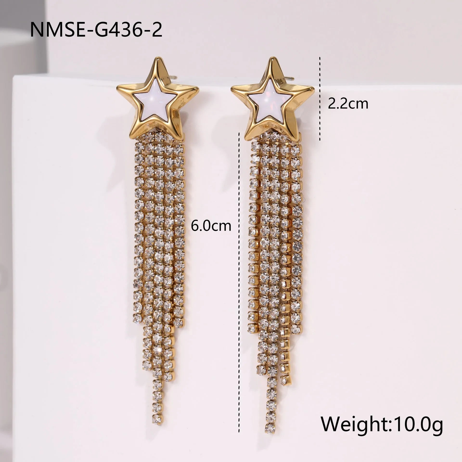 Women's stainless steel earrings with gold plated heart and star shapes in an irregular geometric design.